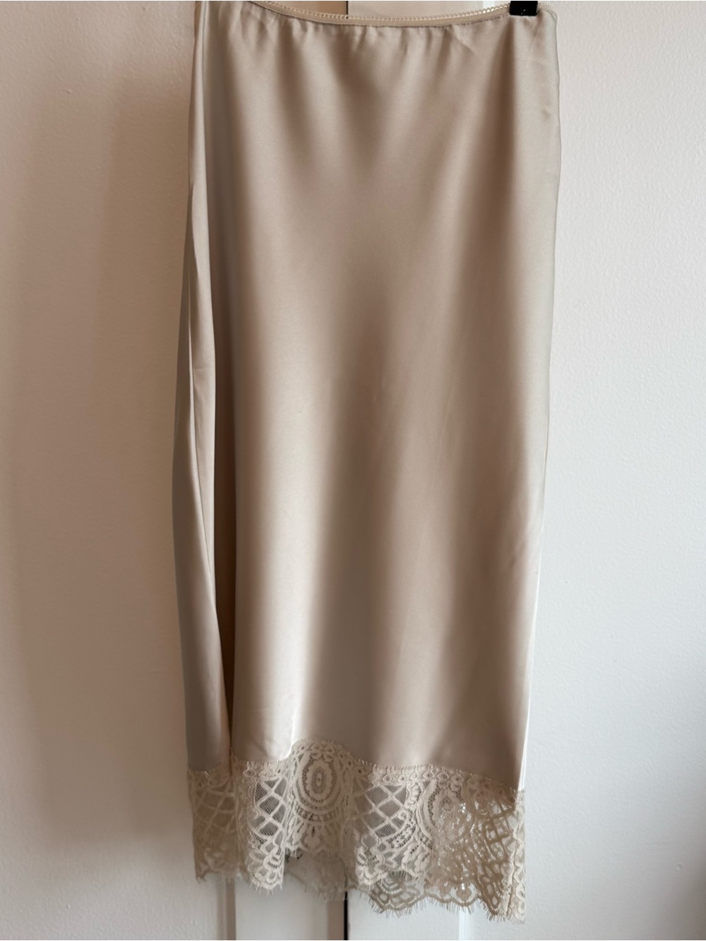 Champagne satin midi skirt with lace trim hem